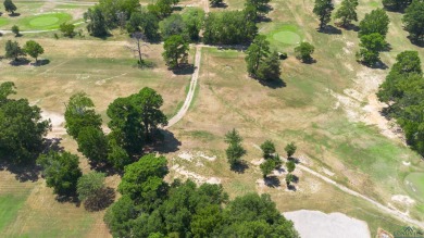 Nestled within the serene surroundings of the classic Longview on Longview Country Club in Texas - for sale on GolfHomes.com, golf home, golf lot