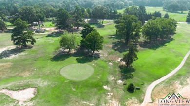 Nestled within the serene surroundings of the classic Longview on Longview Country Club in Texas - for sale on GolfHomes.com, golf home, golf lot