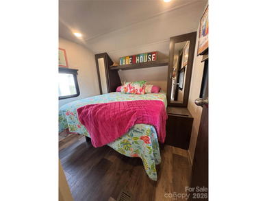 Ideal lake getaway in a true lake-life community. Beautifully on Old North State Club at Uwharrie Point Golf community in North Carolina - for sale on GolfHomes.com, golf home, golf lot