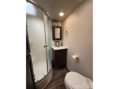 Ideal lake getaway in a true lake-life community. Beautifully on Old North State Club at Uwharrie Point Golf community in North Carolina - for sale on GolfHomes.com, golf home, golf lot