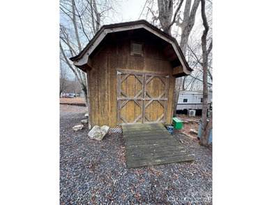 Ideal lake getaway in a true lake-life community. Beautifully on Old North State Club at Uwharrie Point Golf community in North Carolina - for sale on GolfHomes.com, golf home, golf lot