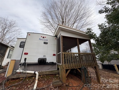 Ideal lake getaway in a true lake-life community. Beautifully on Old North State Club at Uwharrie Point Golf community in North Carolina - for sale on GolfHomes.com, golf home, golf lot