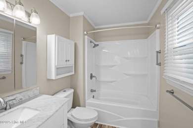 Welcome to this well maintained 3-bedroom, 2-bathroom home on Harbour Point Golf Club in North Carolina - for sale on GolfHomes.com, golf home, golf lot
