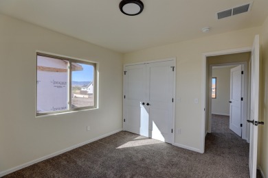 Brand new construction. Located in Hidden Bridge Ranch across on Hidden Bridge Golf Club in Wyoming - for sale on GolfHomes.com, golf home, golf lot