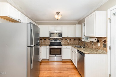 This 2 bedroom, 1.5 bath townhome is situated in a beautiful on Hedingham Golf and Athletic Club in North Carolina - for sale on GolfHomes.com, golf home, golf lot