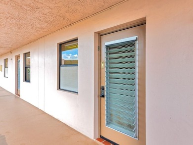 Enjoy stunning lake views from this bright, corner 2-bedroom on Sunrise Lakes Phase IV Golf Course in Florida - for sale on GolfHomes.com, golf home, golf lot