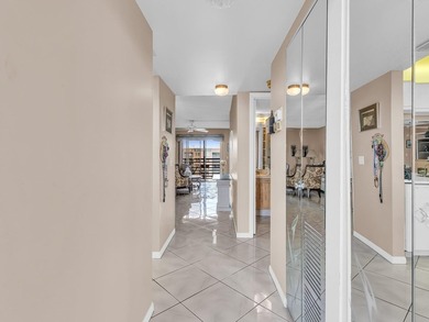 Enjoy stunning lake views from this bright, corner 2-bedroom on Sunrise Lakes Phase IV Golf Course in Florida - for sale on GolfHomes.com, golf home, golf lot