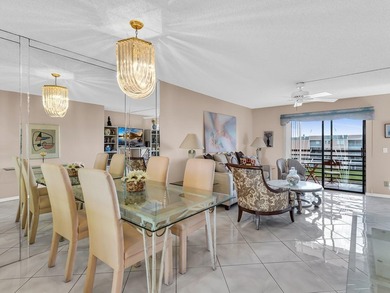 Enjoy stunning lake views from this bright, corner 2-bedroom on Sunrise Lakes Phase IV Golf Course in Florida - for sale on GolfHomes.com, golf home, golf lot