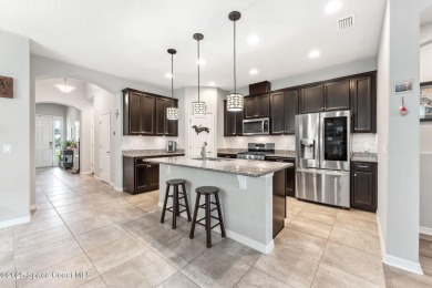 This upgraded Juniper floorplan delivers comfort, style, and on Duran Golf Course in Florida - for sale on GolfHomes.com, golf home, golf lot