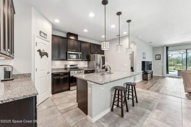This upgraded Juniper floorplan delivers comfort, style, and on Duran Golf Course in Florida - for sale on GolfHomes.com, golf home, golf lot