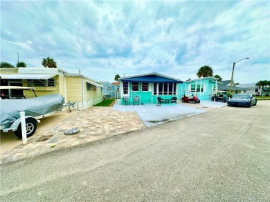 WELCOME TO PARADISE~~~ A GREAT VINTAGE MOBILE HOME ~~~ 2 on Island Dunes Country Club in Florida - for sale on GolfHomes.com, golf home, golf lot