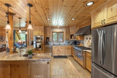 This exquisite custom log home is located in the heart of Bailey on Bailey Creek Golf Course in California - for sale on GolfHomes.com, golf home, golf lot