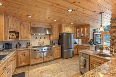 This exquisite custom log home is located in the heart of Bailey on Bailey Creek Golf Course in California - for sale on GolfHomes.com, golf home, golf lot