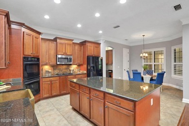 Welcome to this impeccably crafted Mediterranean-style residence on Eagle Landing Golf Club in Florida - for sale on GolfHomes.com, golf home, golf lot