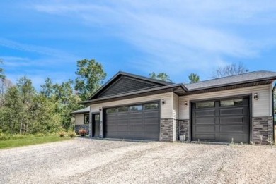 Welcome to your dream home! This stunning new build property on Lake Arrowhead Golf Course - The Pines in Wisconsin - for sale on GolfHomes.com, golf home, golf lot