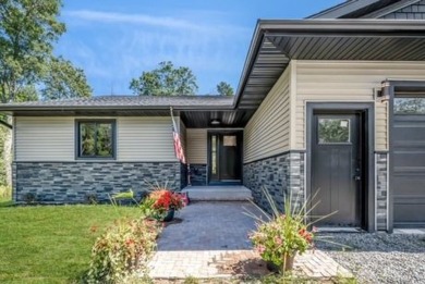 Welcome to your dream home! This stunning new build property on Lake Arrowhead Golf Course - The Pines in Wisconsin - for sale on GolfHomes.com, golf home, golf lot