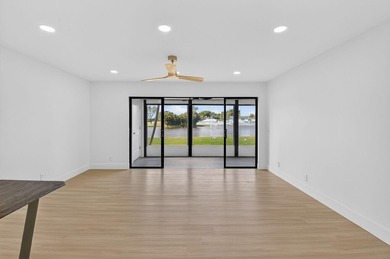 A very rare opportunity to own a first floor waterfront Isle of on Kings Point Golf -Flanders Way in Florida - for sale on GolfHomes.com, golf home, golf lot