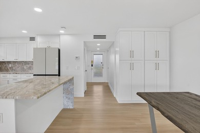 A very rare opportunity to own a first floor waterfront Isle of on Kings Point Golf -Flanders Way in Florida - for sale on GolfHomes.com, golf home, golf lot