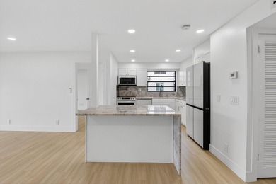 A very rare opportunity to own a first floor waterfront Isle of on Kings Point Golf -Flanders Way in Florida - for sale on GolfHomes.com, golf home, golf lot