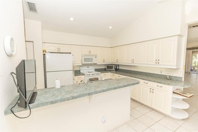 COURTYARD HOME W/ PRIVATE IN-LAW SUITE & NEW TILE ROOF WITH on Rotonda Golf and Country Club The Links Course in Florida - for sale on GolfHomes.com, golf home, golf lot