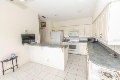 COURTYARD HOME W/ PRIVATE IN-LAW SUITE & NEW TILE ROOF WITH on Rotonda Golf and Country Club The Links Course in Florida - for sale on GolfHomes.com, golf home, golf lot