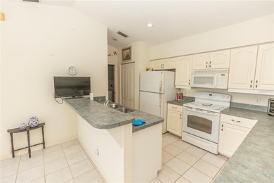 COURTYARD HOME W/ PRIVATE IN-LAW SUITE & NEW TILE ROOF WITH on Rotonda Golf and Country Club The Links Course in Florida - for sale on GolfHomes.com, golf home, golf lot