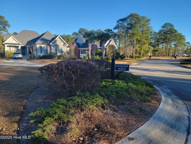 Nicely wooded home site on a quite cul-de-sac in the growing on Ocean Ridge Plantation in North Carolina - for sale on GolfHomes.com, golf home, golf lot