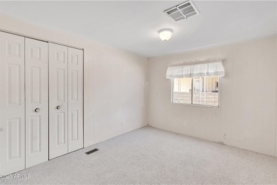 Welcome home to this charming home surrounded by majestic on Tucson Estates Golf Course in Arizona - for sale on GolfHomes.com, golf home, golf lot