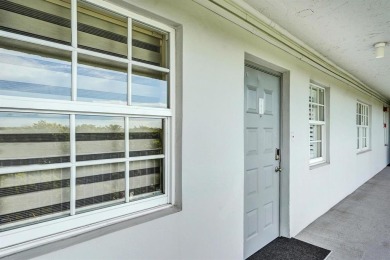 Stunning 3 bedroom, 2.5 bath F model condo in desirable building on Palm-Aire Country Club and Resort - Palms in Florida - for sale on GolfHomes.com, golf home, golf lot