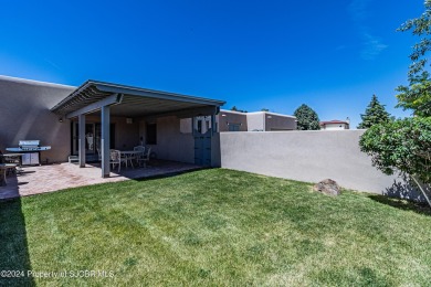 Quintessential Pueblo Revival architecture in Northern New on Pinon Hills Golf Course in New Mexico - for sale on GolfHomes.com, golf home, golf lot