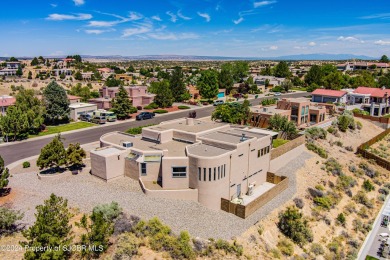 Quintessential Pueblo Revival architecture in Northern New on Pinon Hills Golf Course in New Mexico - for sale on GolfHomes.com, golf home, golf lot