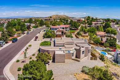 Quintessential Pueblo Revival architecture in Northern New on Pinon Hills Golf Course in New Mexico - for sale on GolfHomes.com, golf home, golf lot