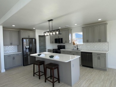 Brand new construction. Located in Hidden Bridge Ranch across on Hidden Bridge Golf Club in Wyoming - for sale on GolfHomes.com, golf home, golf lot