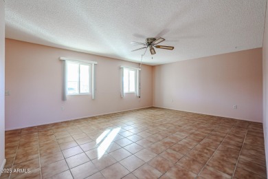 Nestled in a prime location, this beautiful Spanish style home on PalmBrook Country Club in Arizona - for sale on GolfHomes.com, golf home, golf lot
