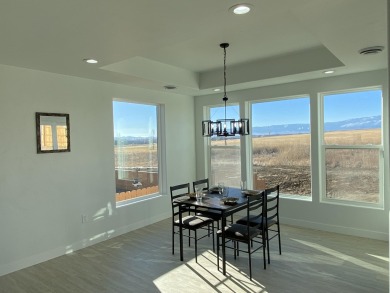 Brand new construction. Located in Hidden Bridge Ranch across on Hidden Bridge Golf Club in Wyoming - for sale on GolfHomes.com, golf home, golf lot