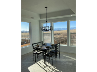 Brand new construction. Located in Hidden Bridge Ranch across on Hidden Bridge Golf Club in Wyoming - for sale on GolfHomes.com, golf home, golf lot