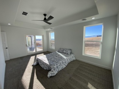 Brand new construction. Located in Hidden Bridge Ranch across on Hidden Bridge Golf Club in Wyoming - for sale on GolfHomes.com, golf home, golf lot