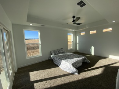 Brand new construction. Located in Hidden Bridge Ranch across on Hidden Bridge Golf Club in Wyoming - for sale on GolfHomes.com, golf home, golf lot