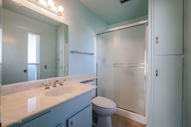Nestled in a prime location, this beautiful Spanish style home on PalmBrook Country Club in Arizona - for sale on GolfHomes.com, golf home, golf lot