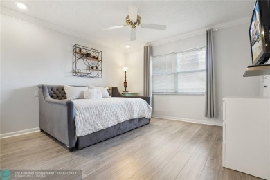 Welcome to your bright and airy 2-bedroom, 2-bathroom condo in on Sunrise Lakes Phase III in Florida - for sale on GolfHomes.com, golf home, golf lot