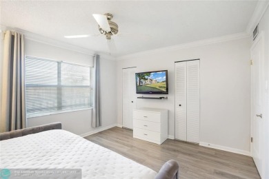Welcome to your bright and airy 2-bedroom, 2-bathroom condo in on Sunrise Lakes Phase III in Florida - for sale on GolfHomes.com, golf home, golf lot