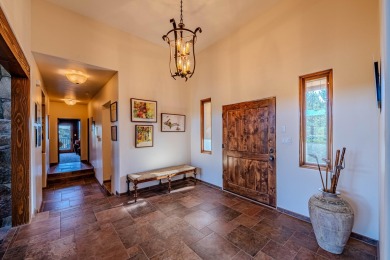 Welcome to 6 Storyteller Ct, a stunning mountain retreat nestled on Paa-Ko Ridge Golf Club  in New Mexico - for sale on GolfHomes.com, golf home, golf lot