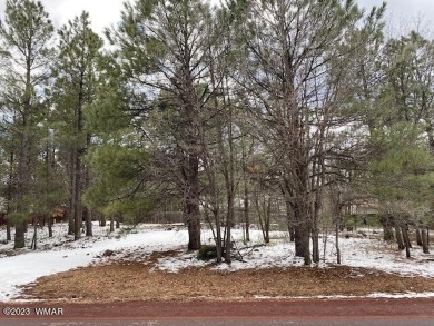 This level residential lot with an abundance trees is nestled in on Pinetop Lakes Golf and Country Club in Arizona - for sale on GolfHomes.com, golf home, golf lot