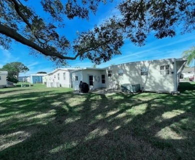 This beautifully furnished and extensively renovated two-bedroom on Fairway Village Golf Course in Florida - for sale on GolfHomes.com, golf home, golf lot