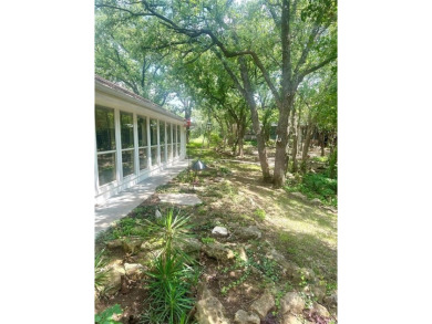 Amon G Carter Lake LAKEFRONT 1.85 Acre lot on a corner with a on Twisted Oaks Golf Club in Texas - for sale on GolfHomes.com, golf home, golf lot
