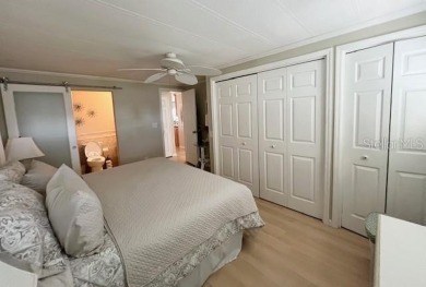 This beautifully furnished and extensively renovated two-bedroom on Fairway Village Golf Course in Florida - for sale on GolfHomes.com, golf home, golf lot