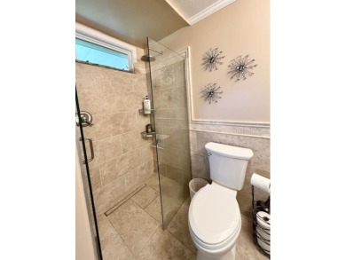 This beautifully furnished and extensively renovated two-bedroom on Fairway Village Golf Course in Florida - for sale on GolfHomes.com, golf home, golf lot