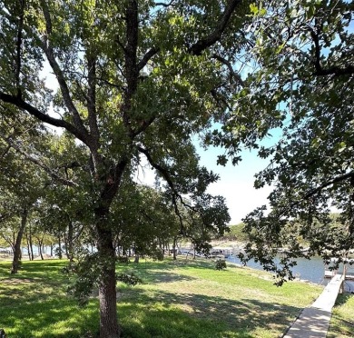 Amon G Carter Lake LAKEFRONT 1.85 Acre lot on a corner with a on Twisted Oaks Golf Club in Texas - for sale on GolfHomes.com, golf home, golf lot