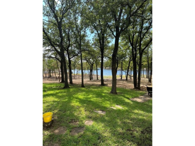 Amon G Carter Lake LAKEFRONT 1.85 Acre lot on a corner with a on Twisted Oaks Golf Club in Texas - for sale on GolfHomes.com, golf home, golf lot