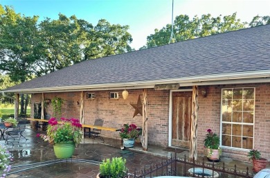 Amon G Carter Lake LAKEFRONT 1.85 Acre lot on a corner with a on Twisted Oaks Golf Club in Texas - for sale on GolfHomes.com, golf home, golf lot